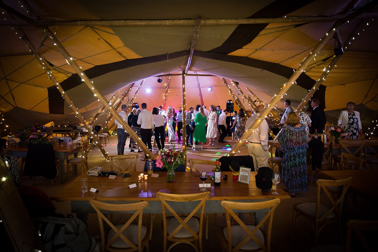 Dancing inside wedding tent